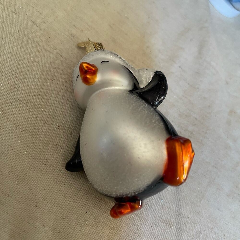 Old World Christmas penguin blown glass ornament